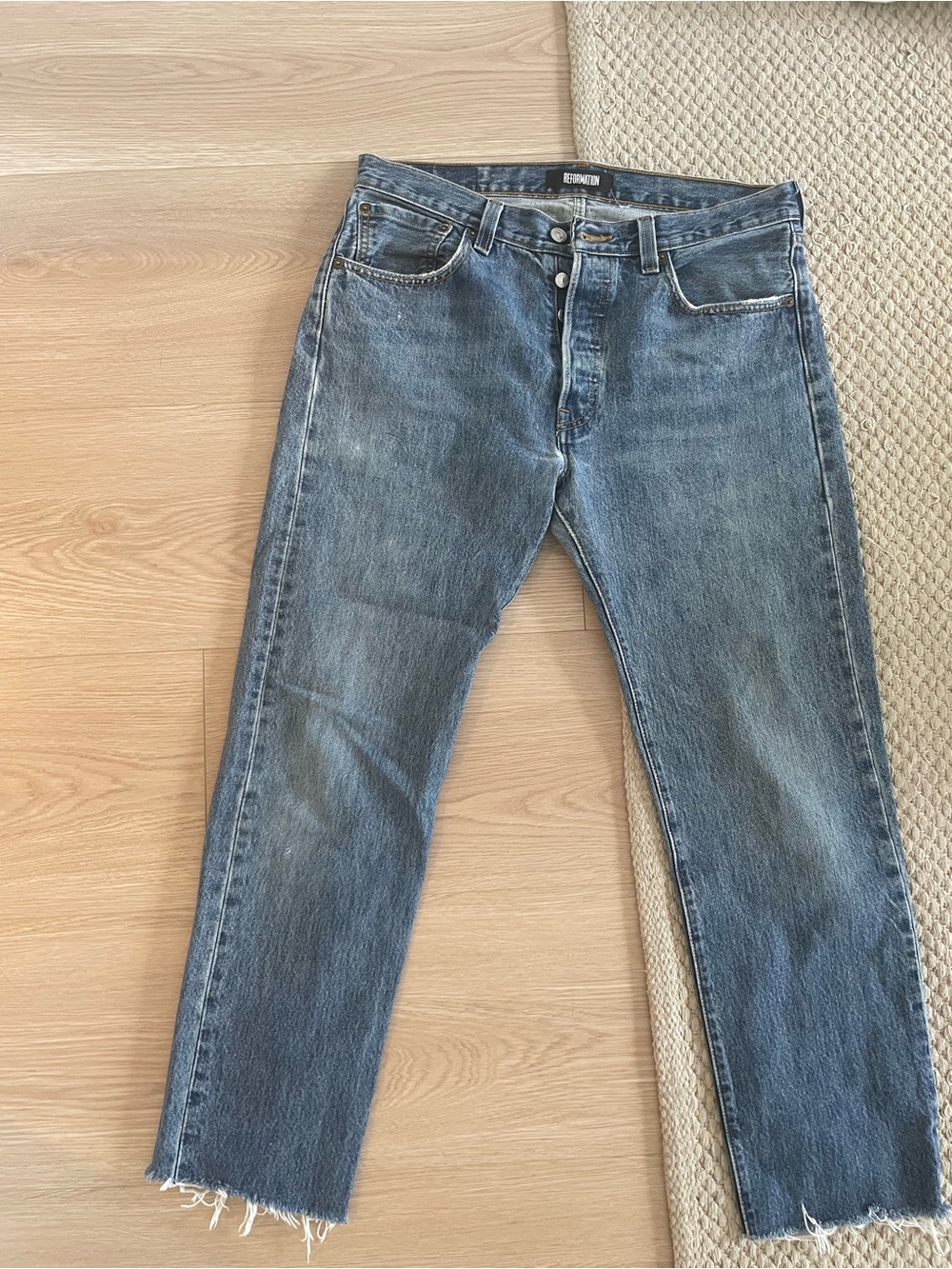 Reformation x Levi’s mid wash denim jeans